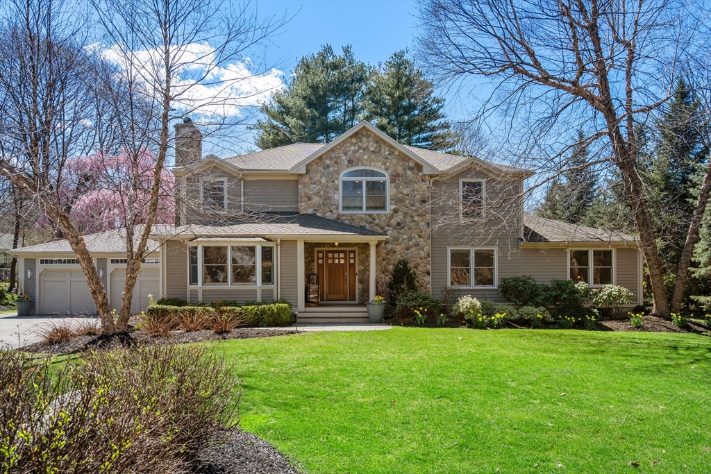 22 Crestview Road Belmont, MA 02478 - Photo 1 of 36 a front view of a house with garden