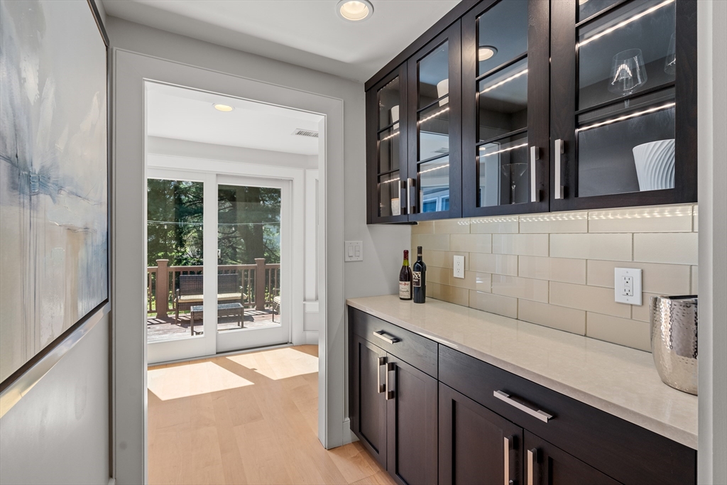 22 Crestview Road Belmont, MA 02478 - Photo 11 of 36 a kitchen with a sink and a refrigerator