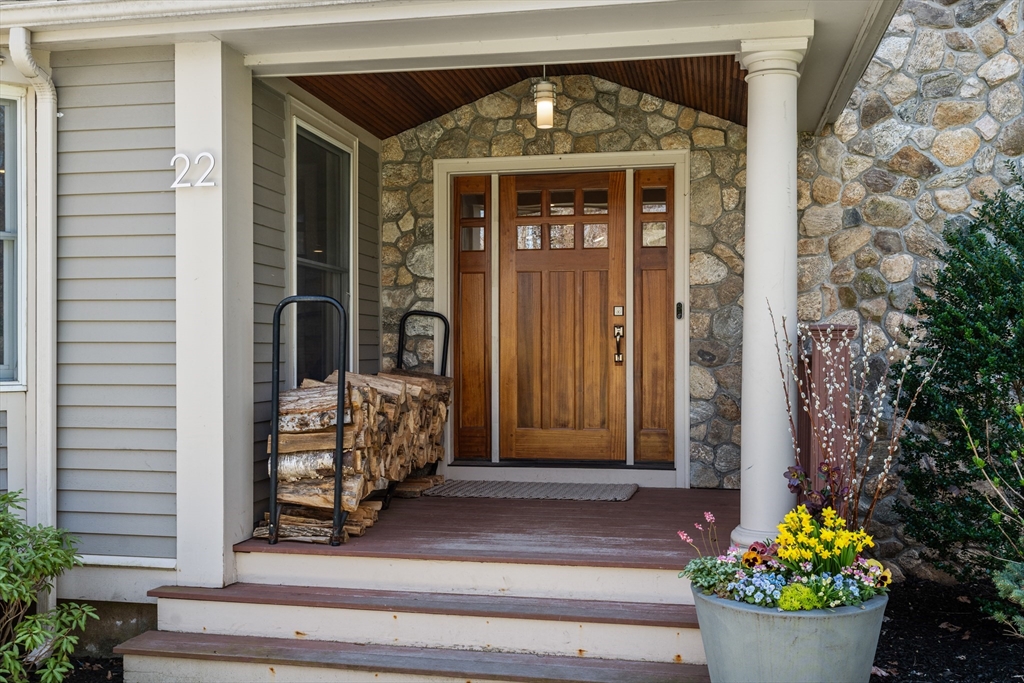 22 Crestview Road Belmont, MA 02478 - Photo 2 of 36 a front view of a house with a potted plant