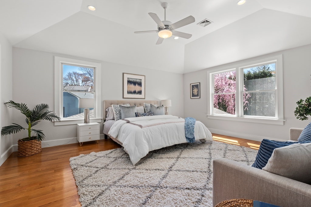 22 Crestview Road Belmont, MA 02478 - Photo 23 of 36 a spacious bedroom with a large bed couch and a window