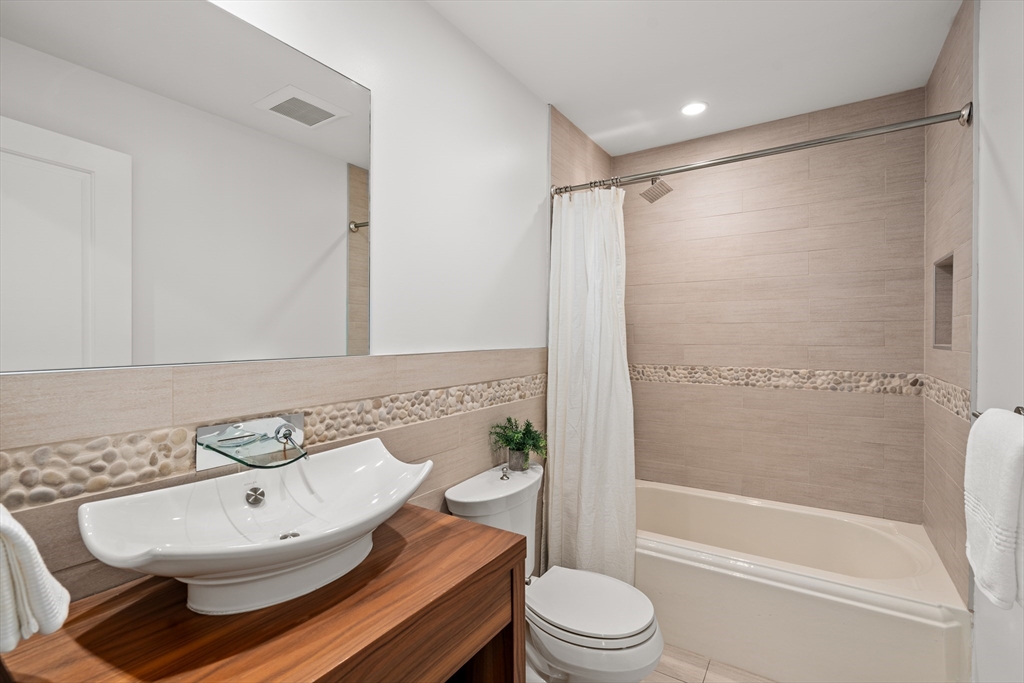 22 Crestview Road Belmont, MA 02478 - Photo 27 of 36 a bathroom with a sink toilet and shower