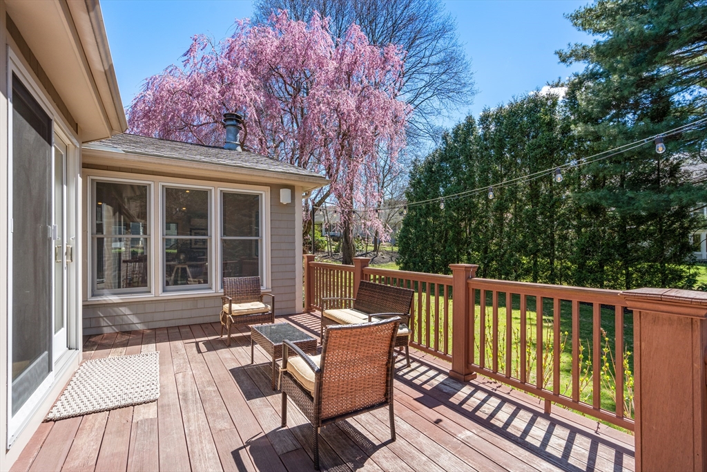 22 Crestview Road Belmont, MA 02478 - Photo 28 of 36 a view of a chair and table on the deck