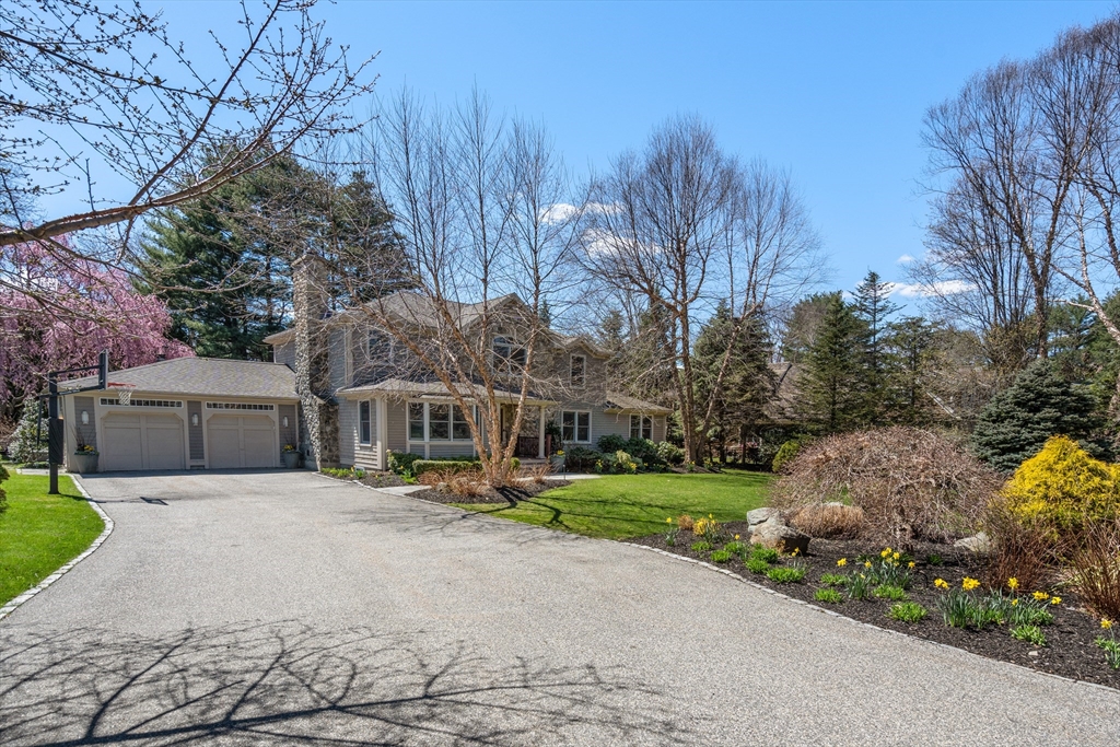 22 Crestview Road Belmont, MA 02478 - Photo 34 of 36 a front view of a house with a yard and trees