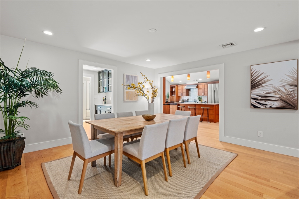22 Crestview Road Belmont, MA 02478 - Photo 7 of 36 a view of a dining room with furniture and wooden floor