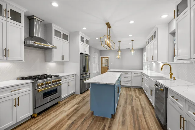 a kitchen with a wooden floor and window