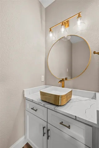 a view of room window and a ceiling fan