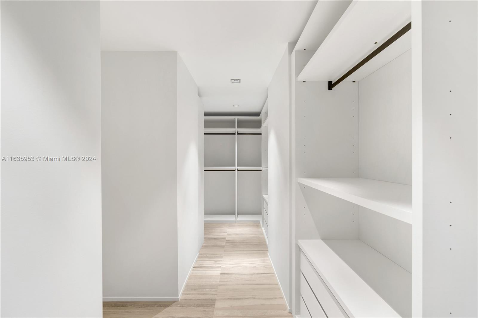 1000 Biscayne Boulevard, Unit 1202 Miami, FL 33132 - Photo 13 of 23 a view of a walk in closet