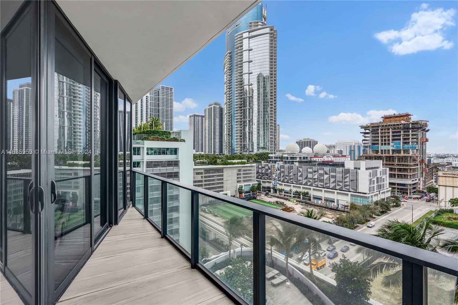 1000 Biscayne Boulevard, Unit 1202 Miami, FL 33132 - Photo 19 of 23 a city view from a balcony