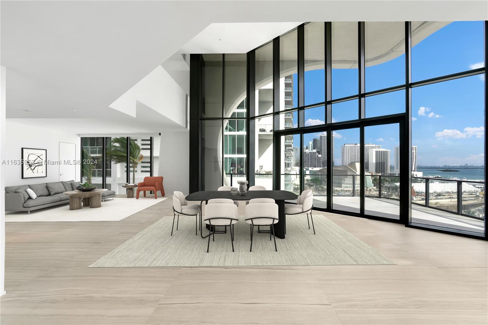 1000 Biscayne Boulevard, Unit 1202 Miami, FL 33132 - Photo 4 of 23 a living room with furniture and a large window