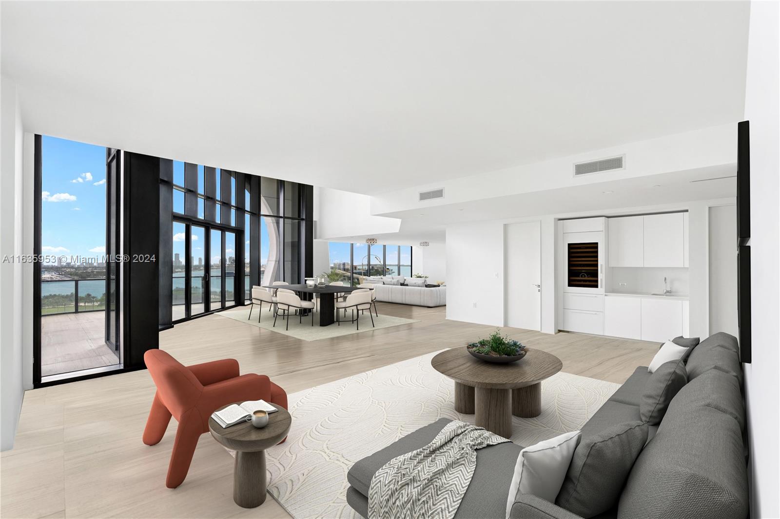 1000 Biscayne Boulevard, Unit 1202 Miami, FL 33132 - Photo 5 of 23 a living room with furniture a flat screen tv and floor to ceiling window