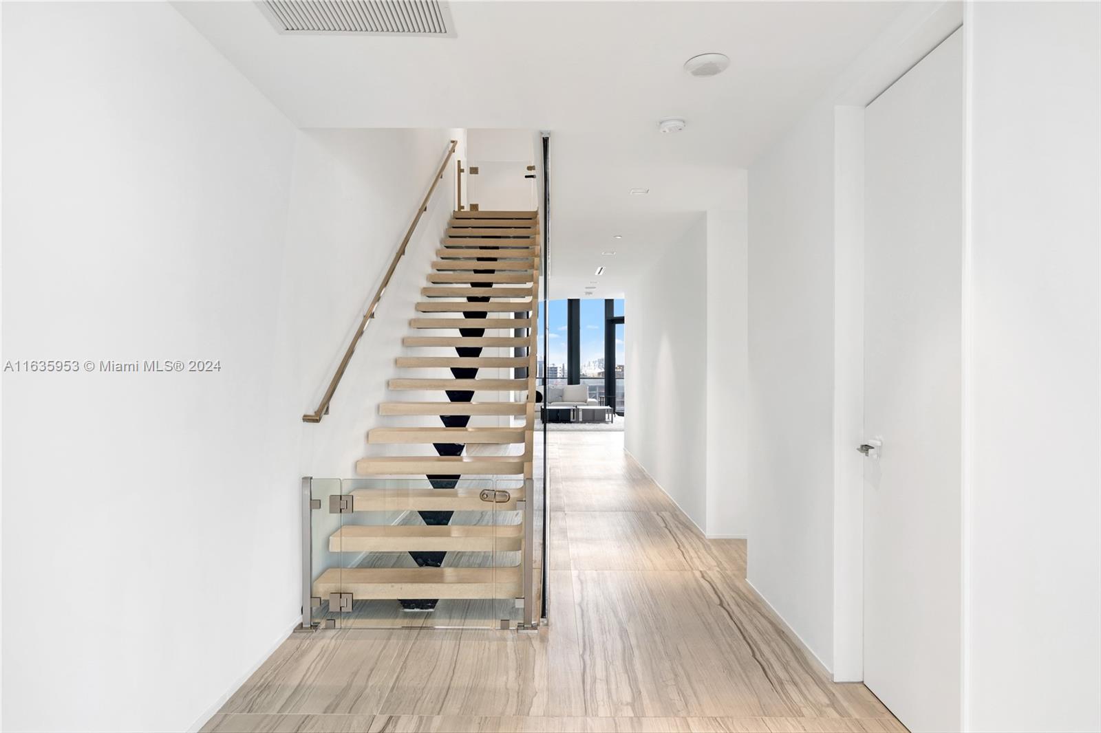 1000 Biscayne Boulevard, Unit 1202 Miami, FL 33132 - Photo 9 of 23 a view of entryway with wooden floor