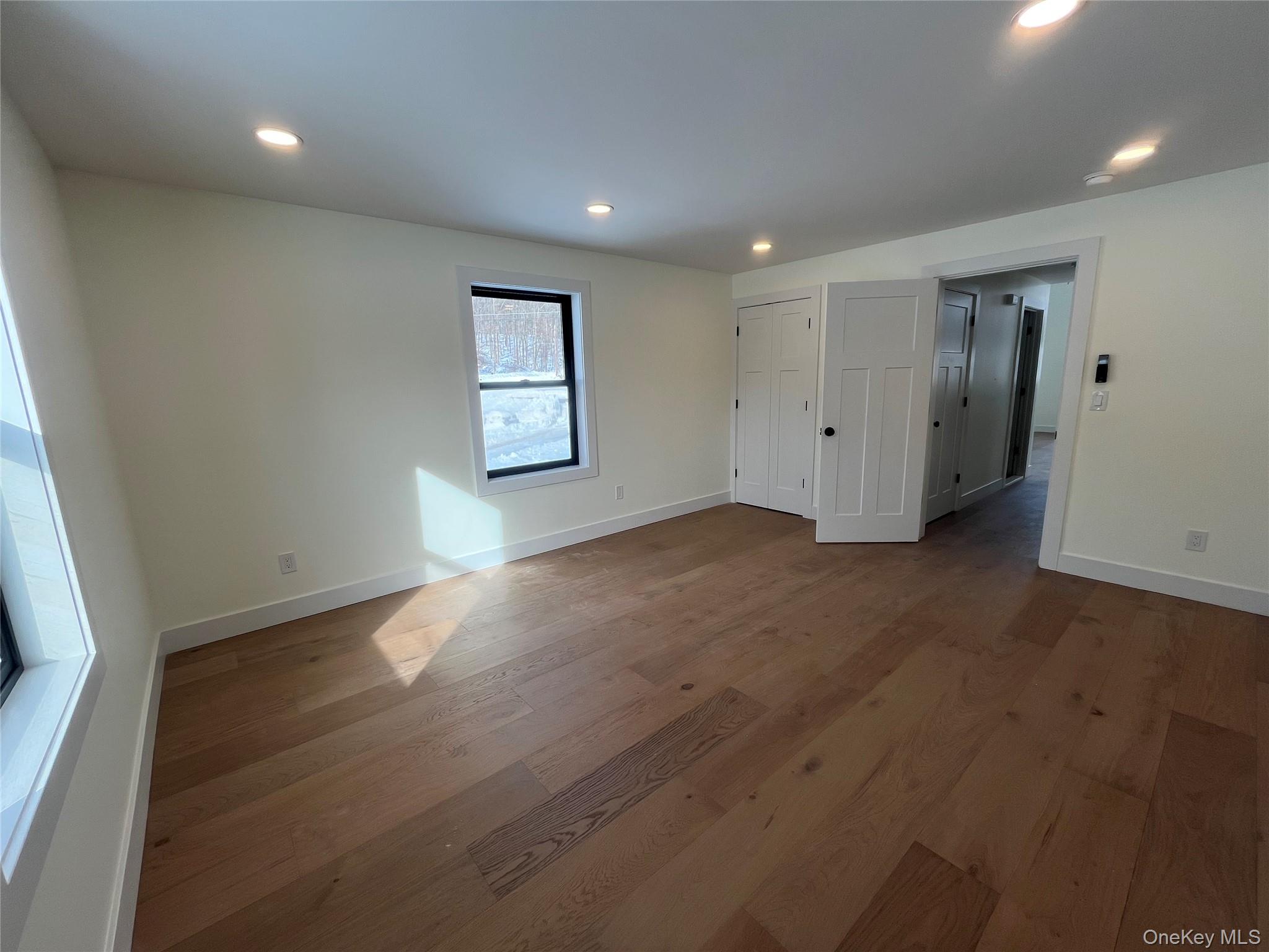 119 Bakertown Road Accord, NY 12404 - Photo 15 of 17 Spacious Bedroom featuring wide plank hardwood floors