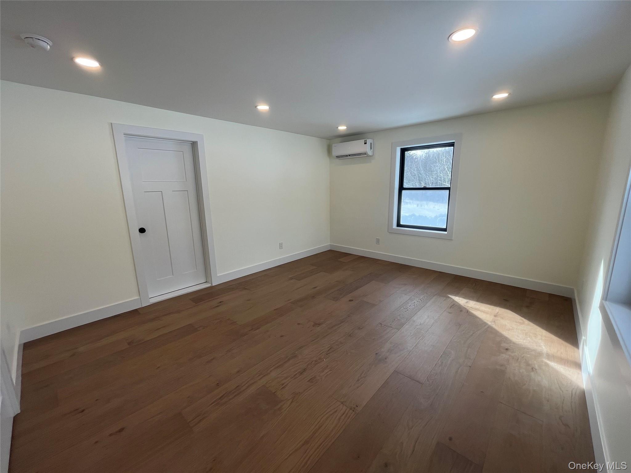 119 Bakertown Road Accord, NY 12404 - Photo 16 of 17 Spacious Bedroom featuring wide plank hardwood floors