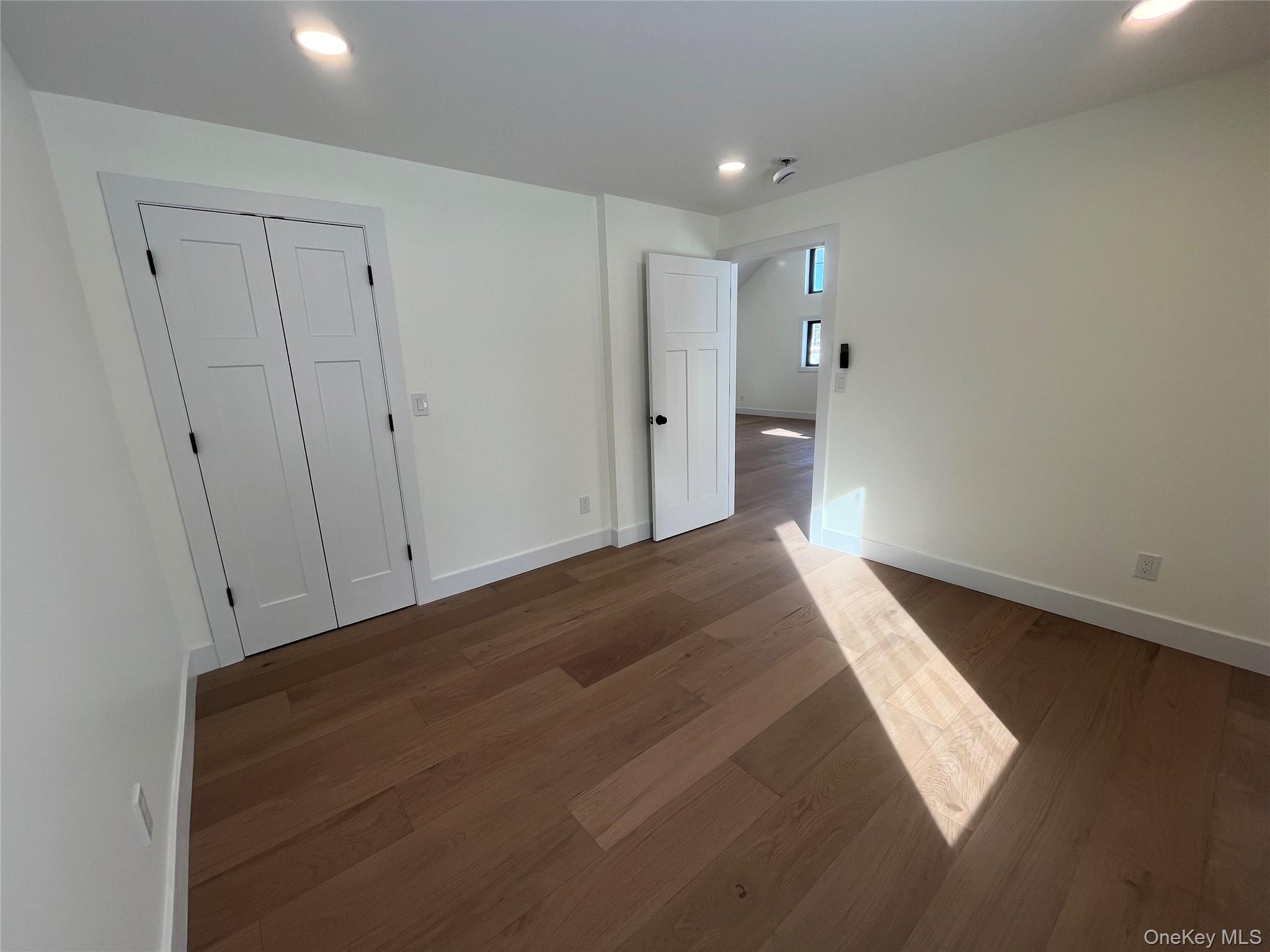 119 Bakertown Road Accord, NY 12404 - Photo 17 of 17 Spacious Bedroom featuring wide plank hardwood floors