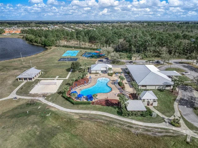a view of a lake with a yard
