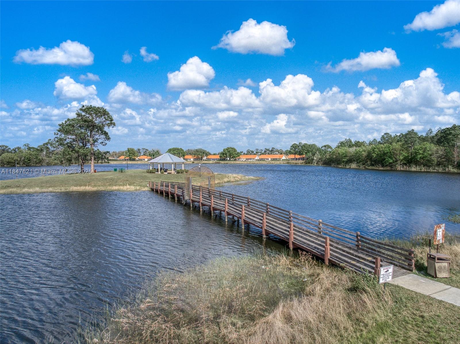 4715 Leucadendra Drive Sebring, FL 33872 - Photo 29 of 50 a view of a lake with outdoor space
