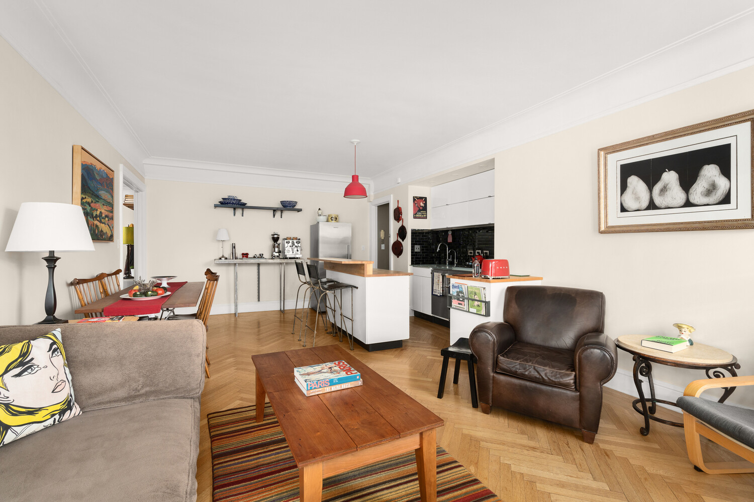 395 Riverside Drive, Unit 7C Manhattan, NY 10025 - Photo 2 of 10 a living room with furniture and a flat screen tv