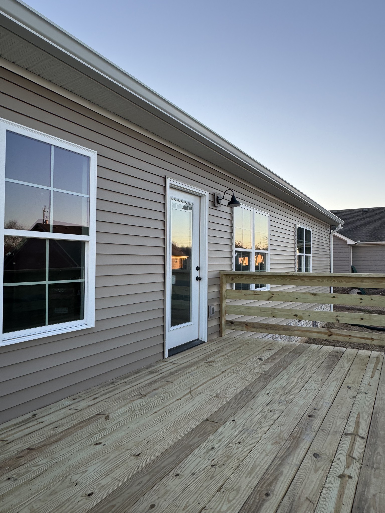 107 Thacker Drive Portland, TN 37148 - Photo 4 of 4 a view of a house with a wooden deck