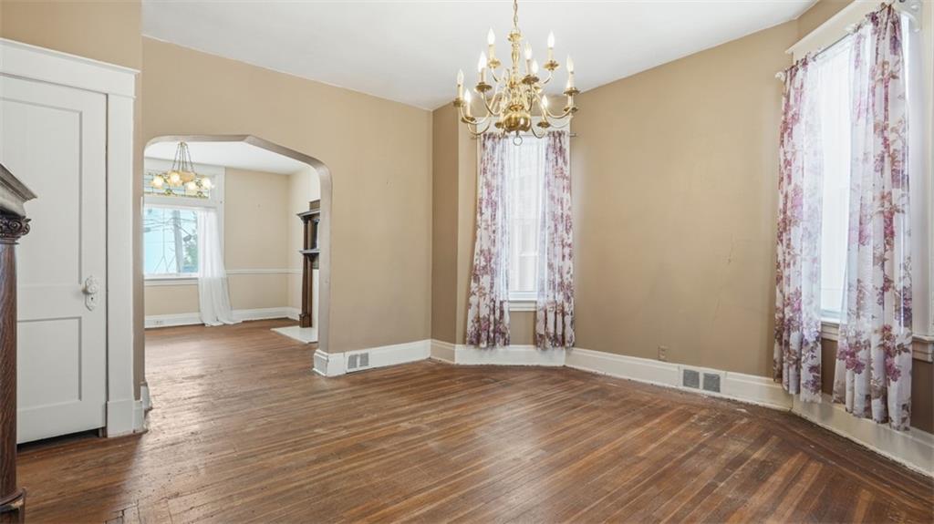 2129 Vodeli Street Pittsburgh, PA 15216 - Photo 11 of 35 a view of a big room with wooden floor and windows