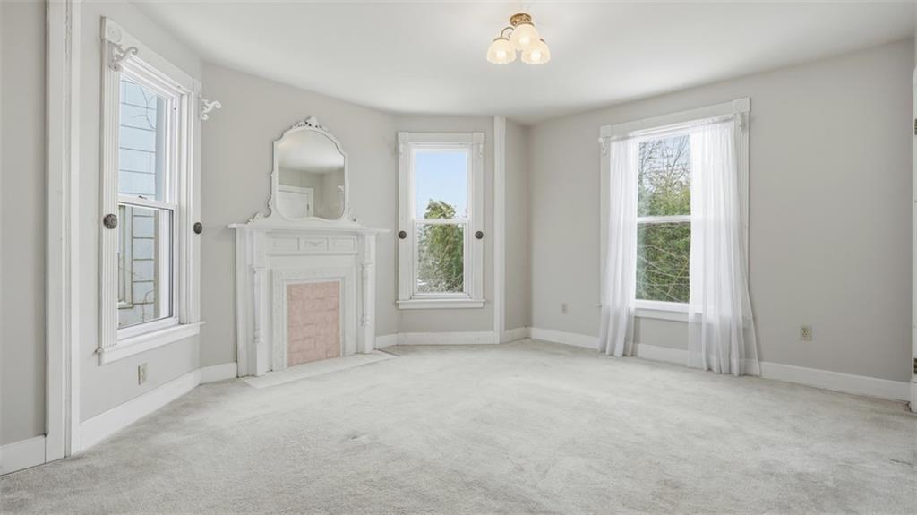 2129 Vodeli Street Pittsburgh, PA 15216 - Photo 17 of 35 an empty room with windows and closet