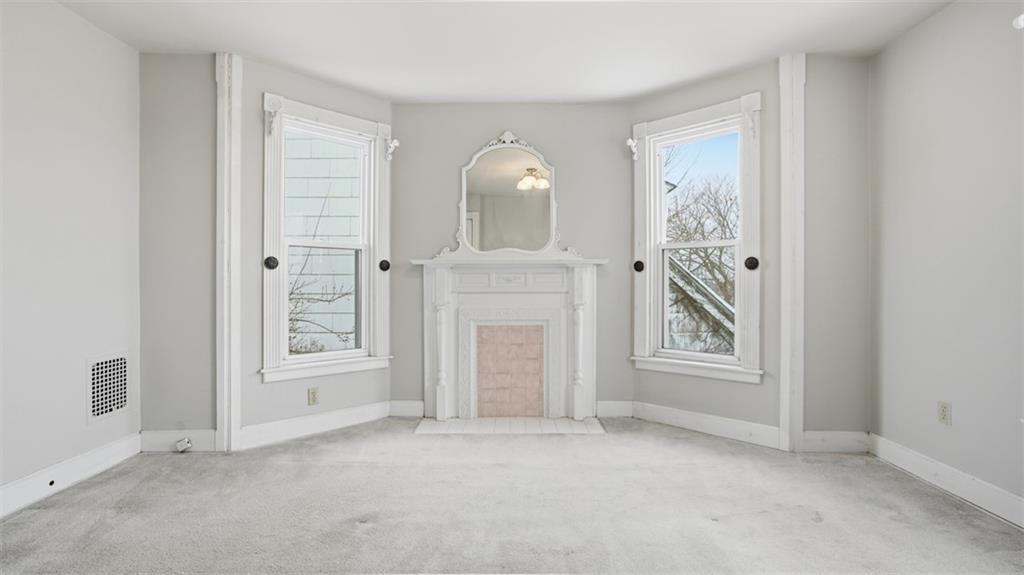 2129 Vodeli Street Pittsburgh, PA 15216 - Photo 18 of 35 an empty room with windows and closet