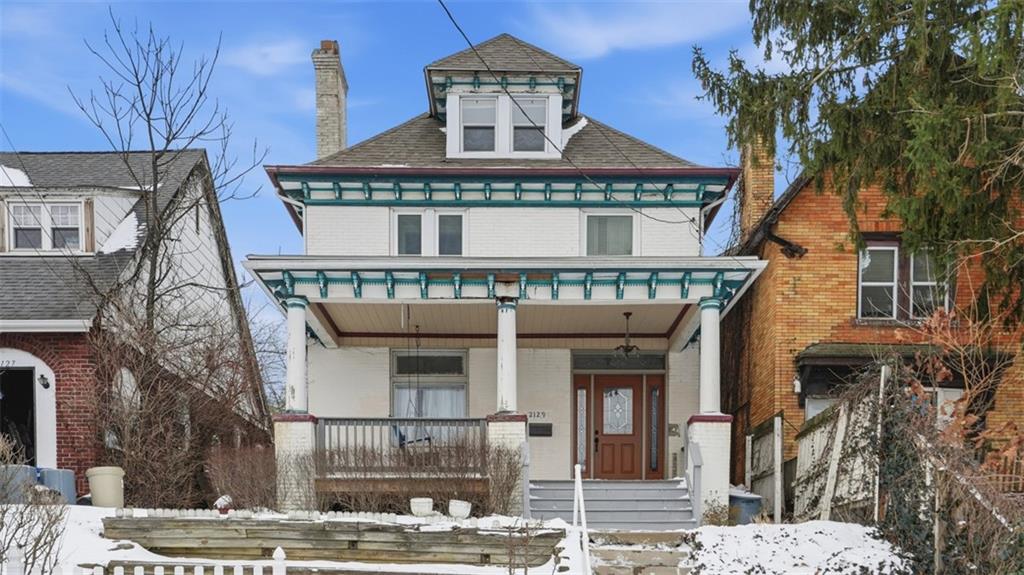2129 Vodeli Street Pittsburgh, PA 15216 - Photo 2 of 35 a front view of a building with balcony