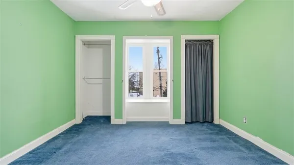 an empty room with windows
