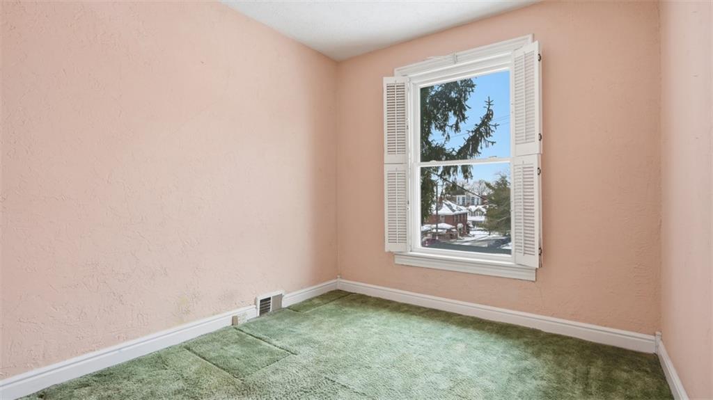 2129 Vodeli Street Pittsburgh, PA 15216 - Photo 23 of 35 an empty room with windows