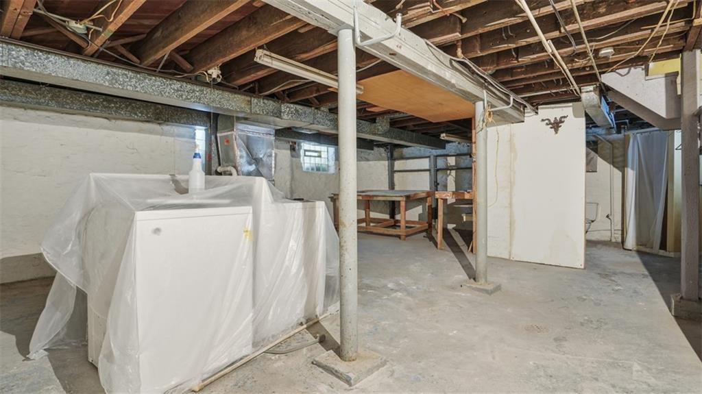 2129 Vodeli Street Pittsburgh, PA 15216 - Photo 31 of 35 a view of a storage & utility room with washer and dryer