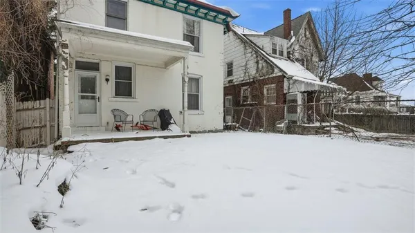 a view of road and house