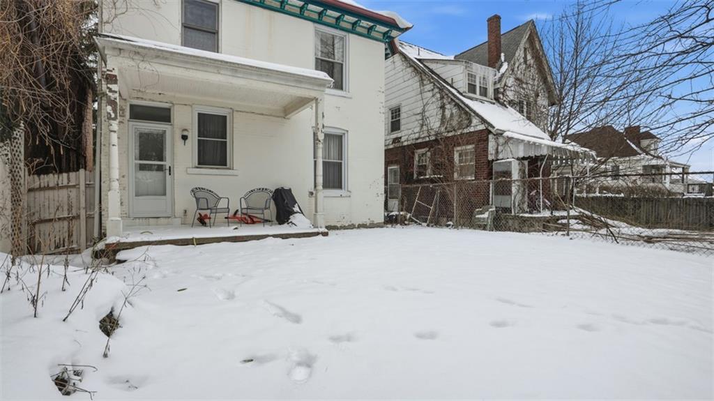 2129 Vodeli Street Pittsburgh, PA 15216 - Photo 33 of 35 a view of a house with snow on the road