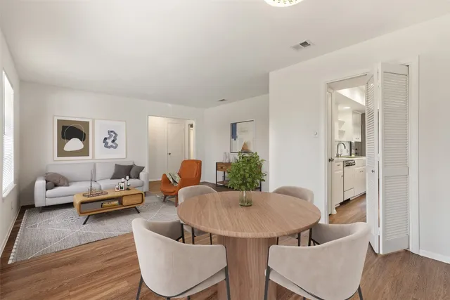 a kitchen with cabinets and appliances