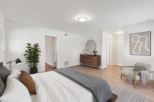 a kitchen with granite countertop a sink stove and cabinets