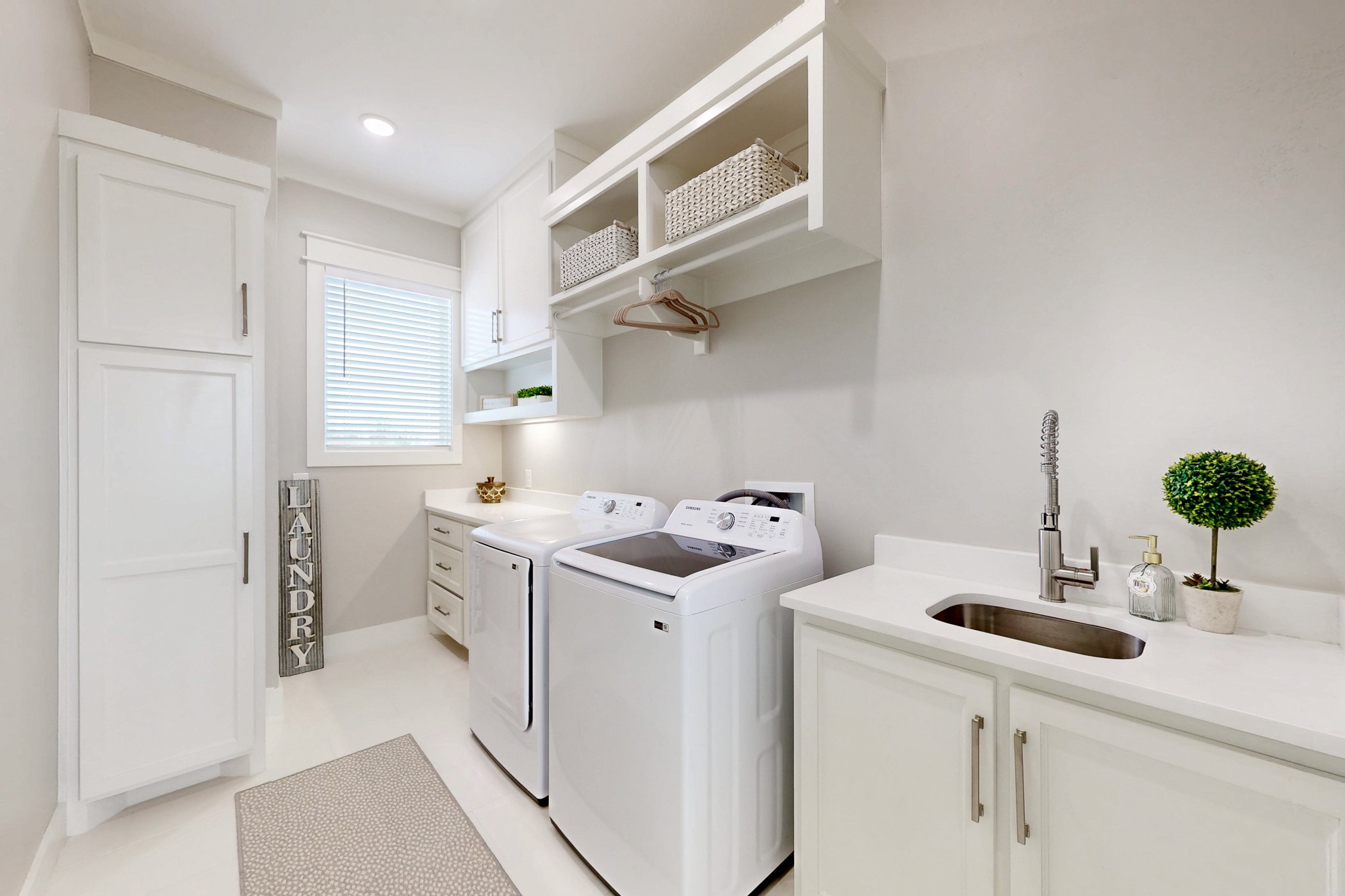 13504 Hudson Farms Road Franklin, TX 77856 - Photo 15 of 49 a view of a kitchen with sink and washing machine