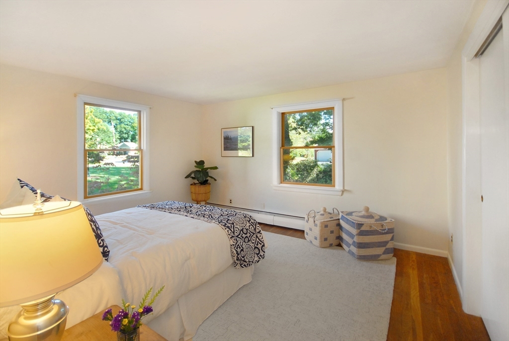 33 Monsen Road Concord, MA 01742 - Photo 23 of 34 a bedroom with a bed and a window