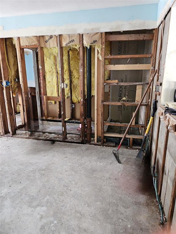 5400 Circle Drive Weeki Wachee, FL 34607 - Photo 13 of 14 a view of an empty room with stairs