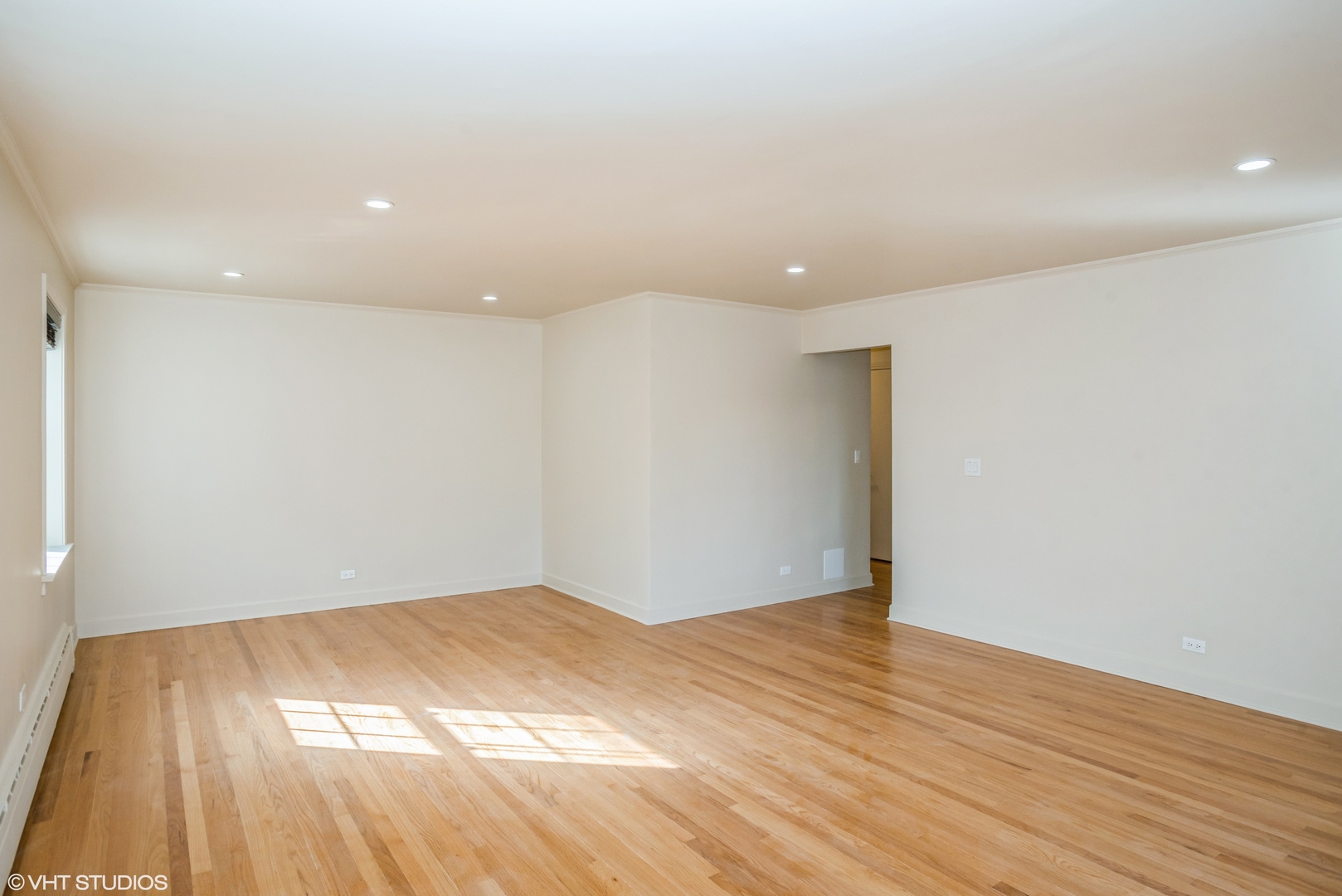 348 Ridge Avenue, Unit 2 Evanston, IL 60202 - Photo 4 of 16 a view of empty room with wooden floor