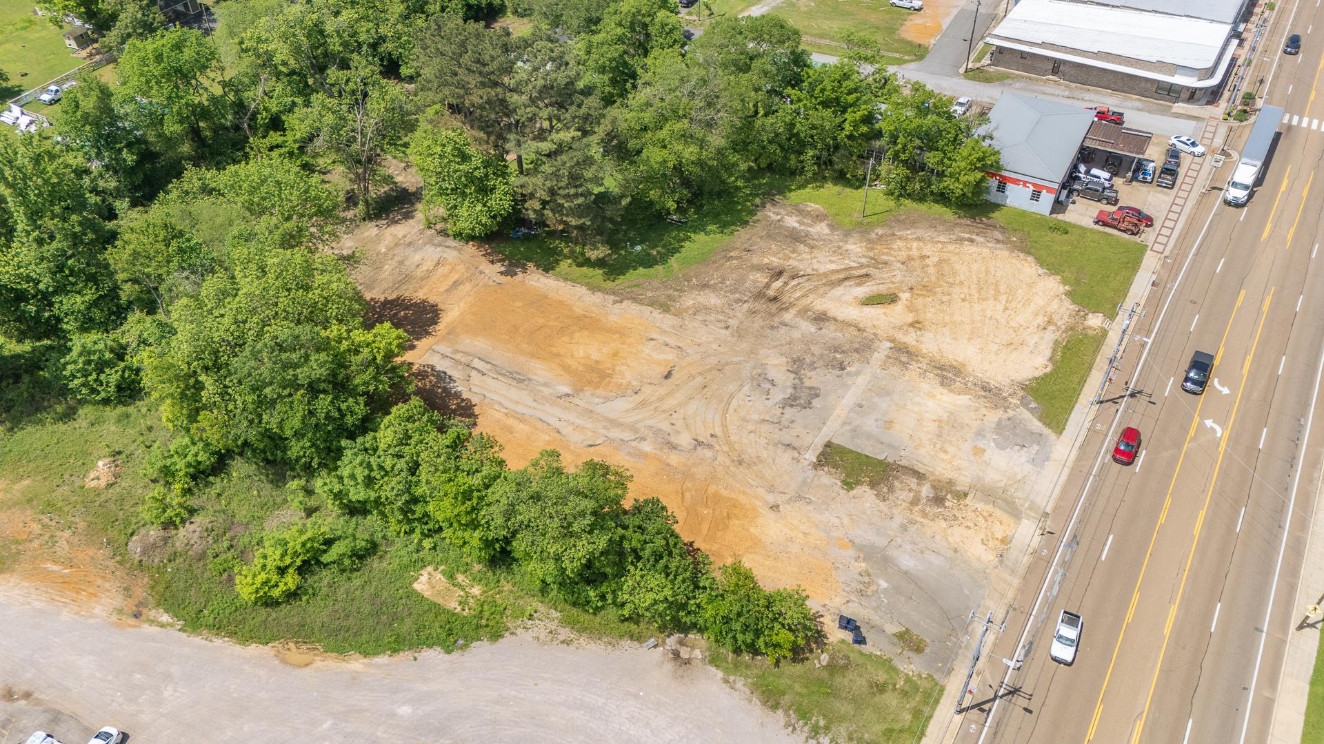211 East Main Street Adamsville, TN 38310 - Photo 2 of 7 a view of backyard with pathway