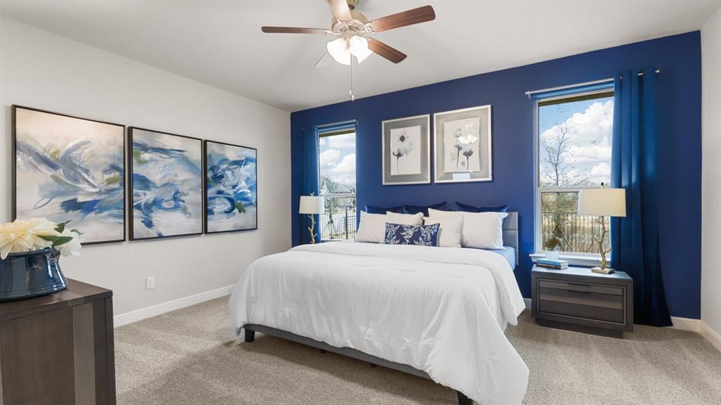 227 Windmill Drive Rhome, TX 76078 - Photo 13 of 34 a bedroom with a bed and a painting on the wall