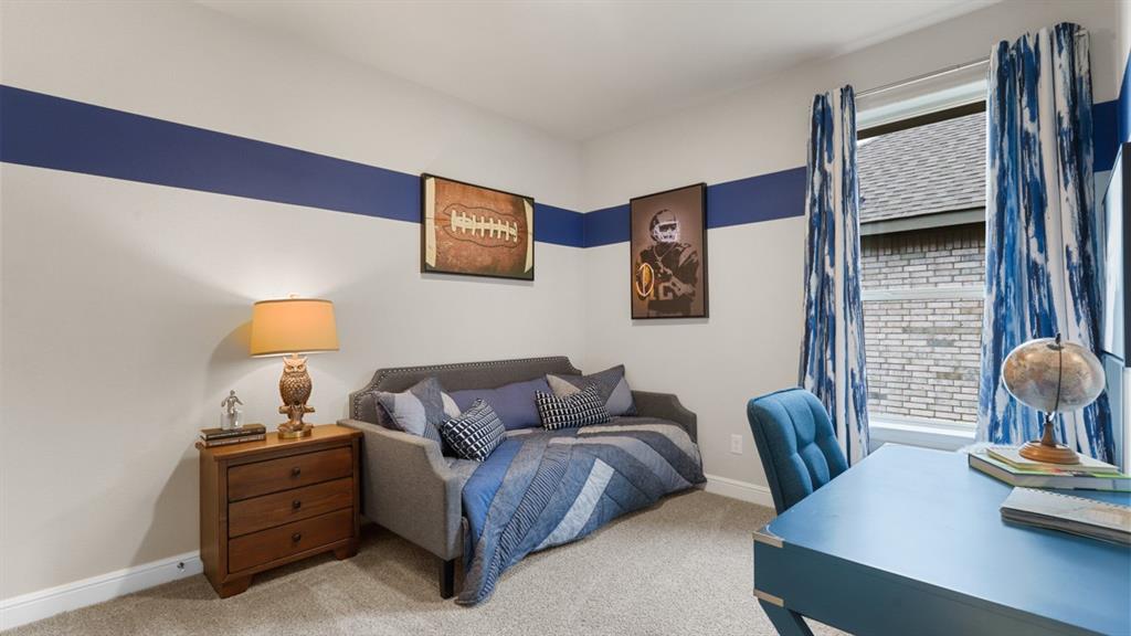 227 Windmill Drive Rhome, TX 76078 - Photo 20 of 34 a living room with furniture and a lamp