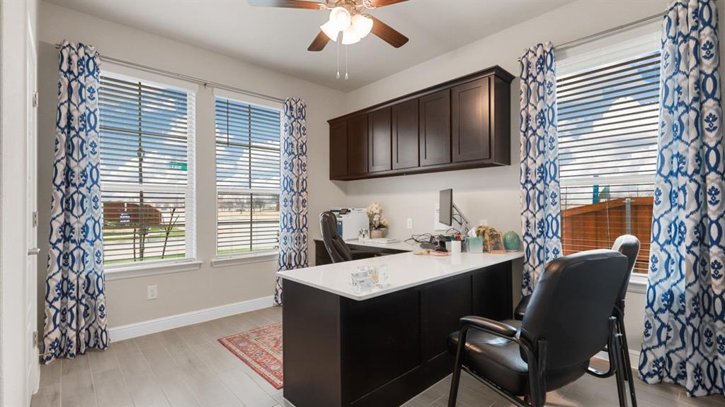 227 Windmill Drive Rhome, TX 76078 - Photo 25 of 34 a kitchen with a stove a sink and dishwasher