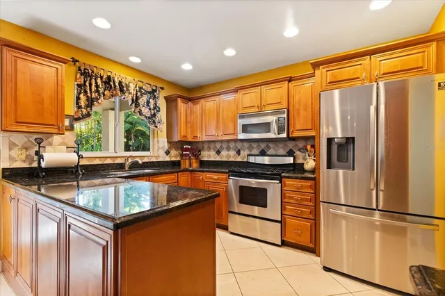 $695,000 | 13817 Cypress Village Circle, Tampa, FL 33618