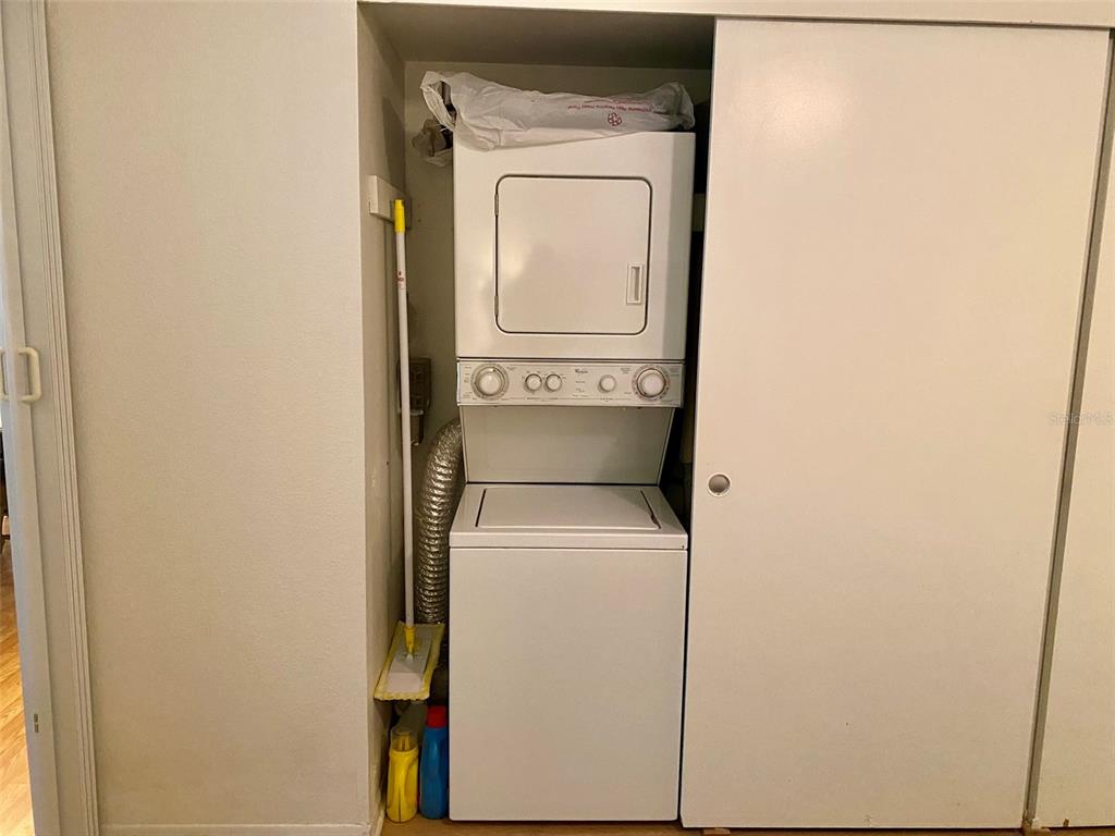 2360 Irish Lane, Unit 64 Clearwater, FL 33763 - Photo 19 of 45 a utility room with dryer and washer