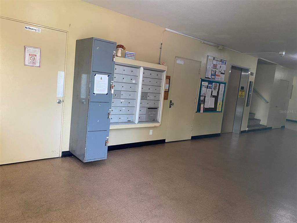 2360 Irish Lane, Unit 64 Clearwater, FL 33763 - Photo 24 of 45 a view of an empty room with workspace and closet