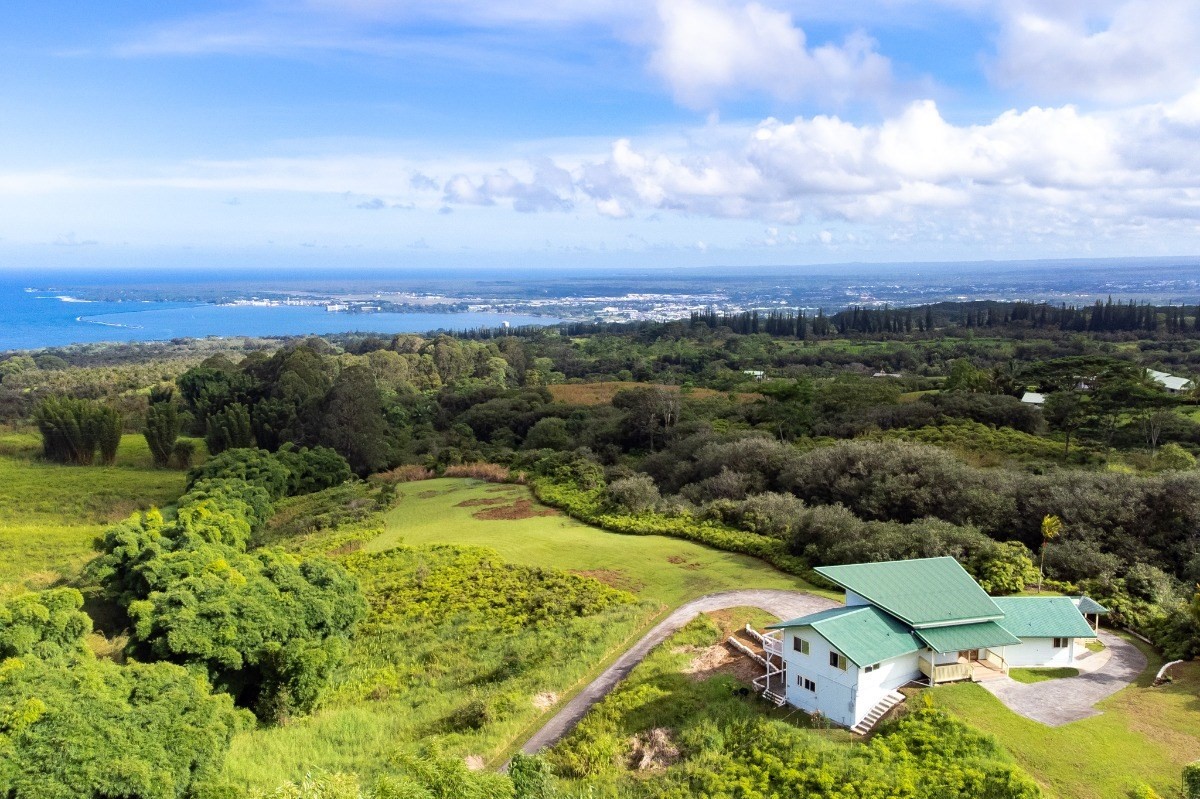 2100 Kaiwiki Road Hilo, HI 96720 - Photo 1 of 29 a view of a city with mountains in the background