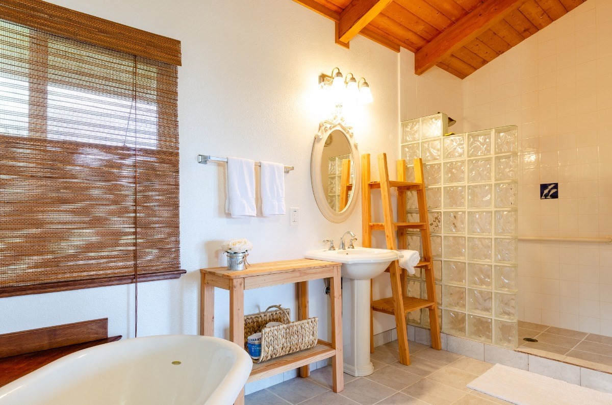 2100 Kaiwiki Road Hilo, HI 96720 - Photo 18 of 29 a bathroom with a sink and a mirror
