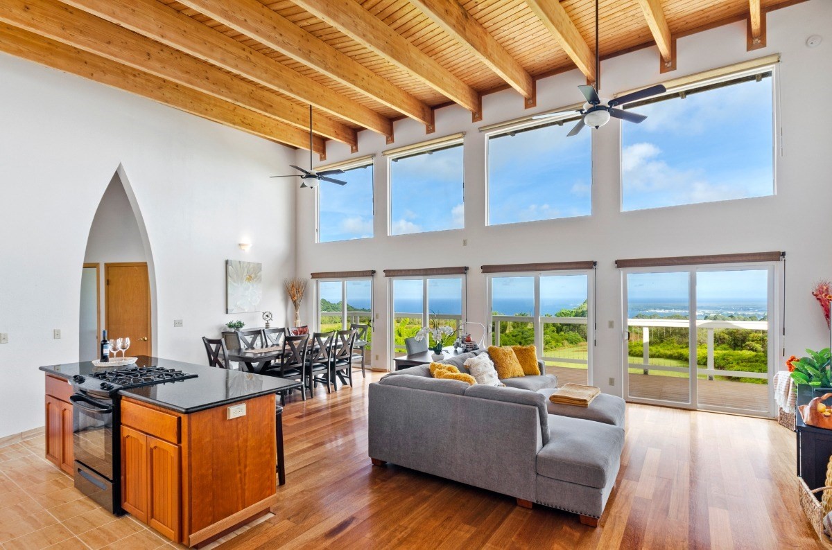 2100 Kaiwiki Road Hilo, HI 96720 - Photo 2 of 29 a living room with furniture and a large window