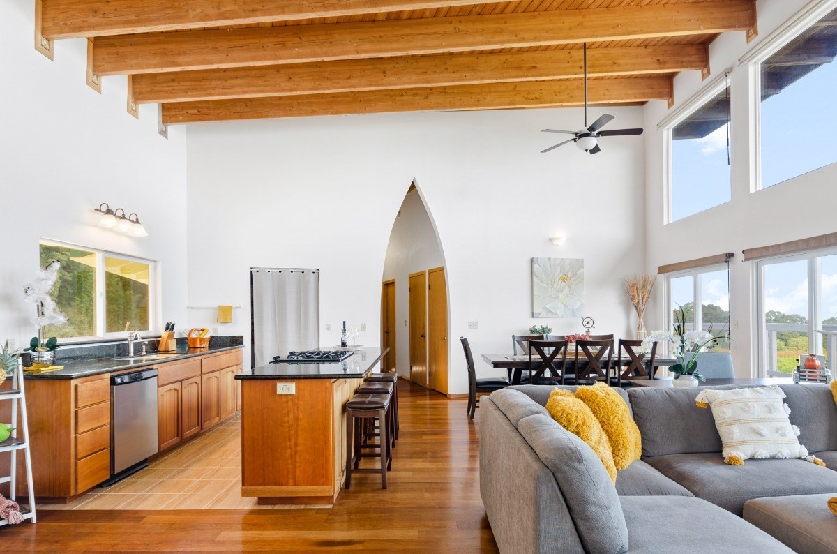 2100 Kaiwiki Road Hilo, HI 96720 - Photo 6 of 29 a living room with stainless steel appliances furniture windows and a kitchen view