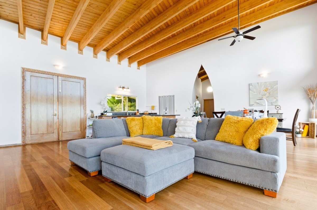 2100 Kaiwiki Road Hilo, HI 96720 - Photo 7 of 29 a living room with furniture and wooden floor