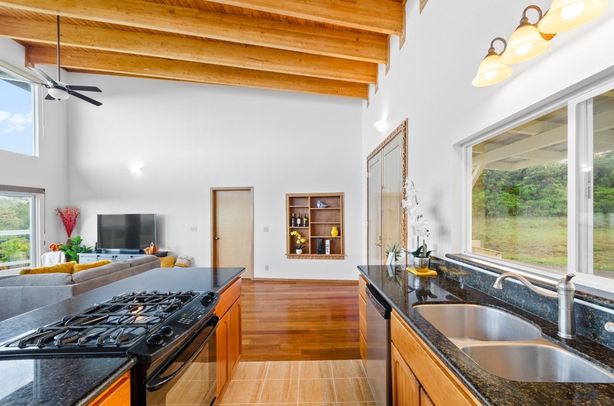 2100 Kaiwiki Road Hilo, HI 96720 - Photo 8 of 29 a kitchen with lots of counter top space and a sink